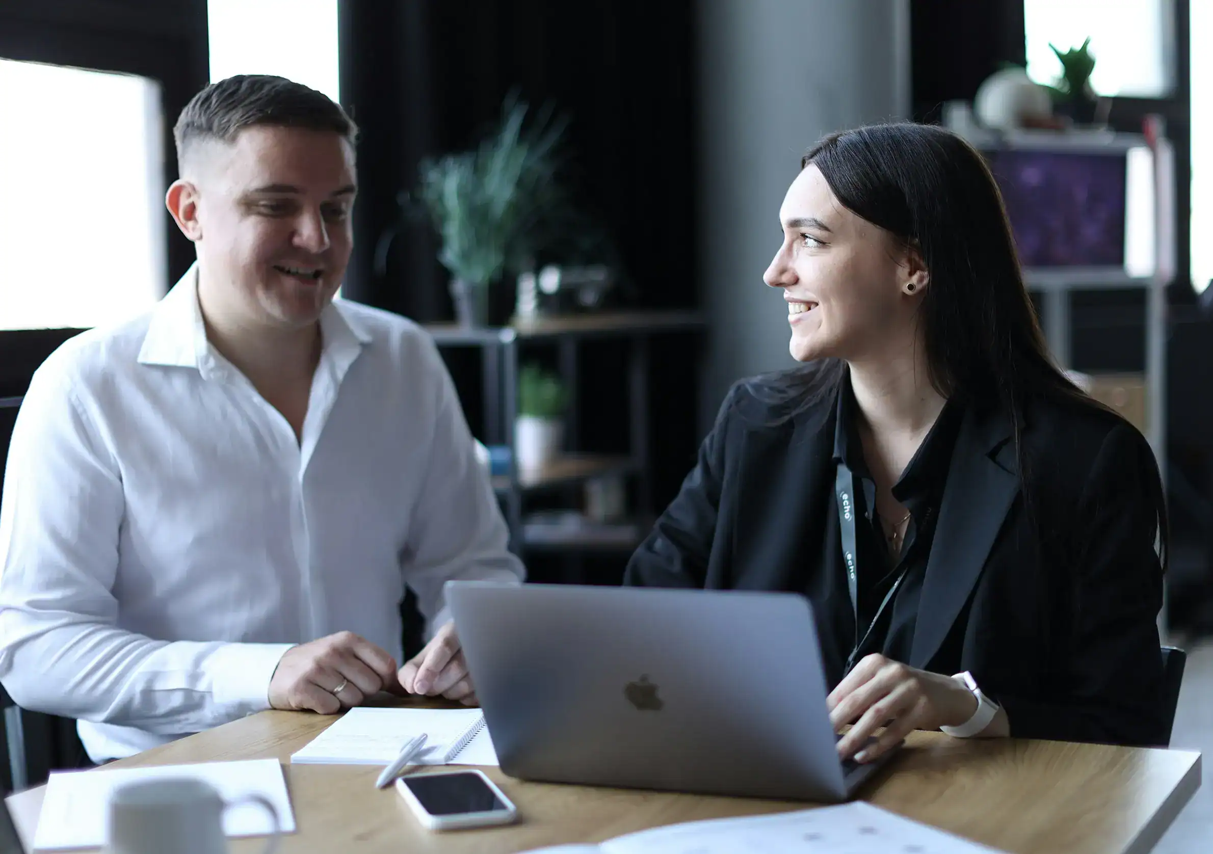 Professionals discussing third party risk management strategy