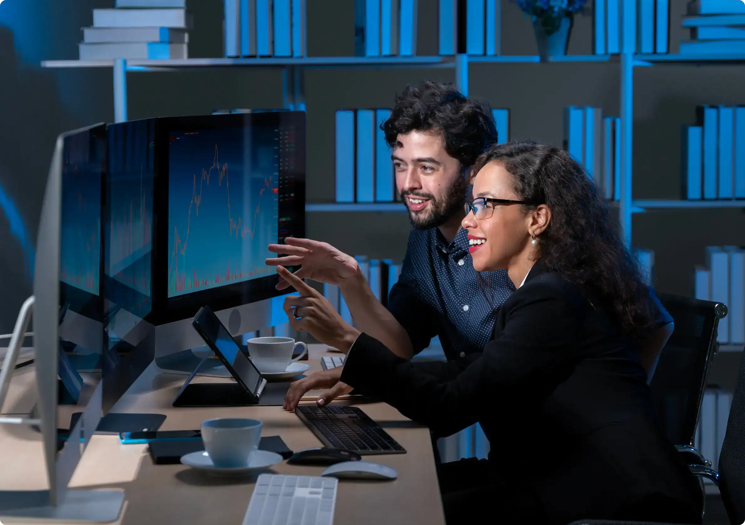 Professionals discussing it audit services and analyzing data