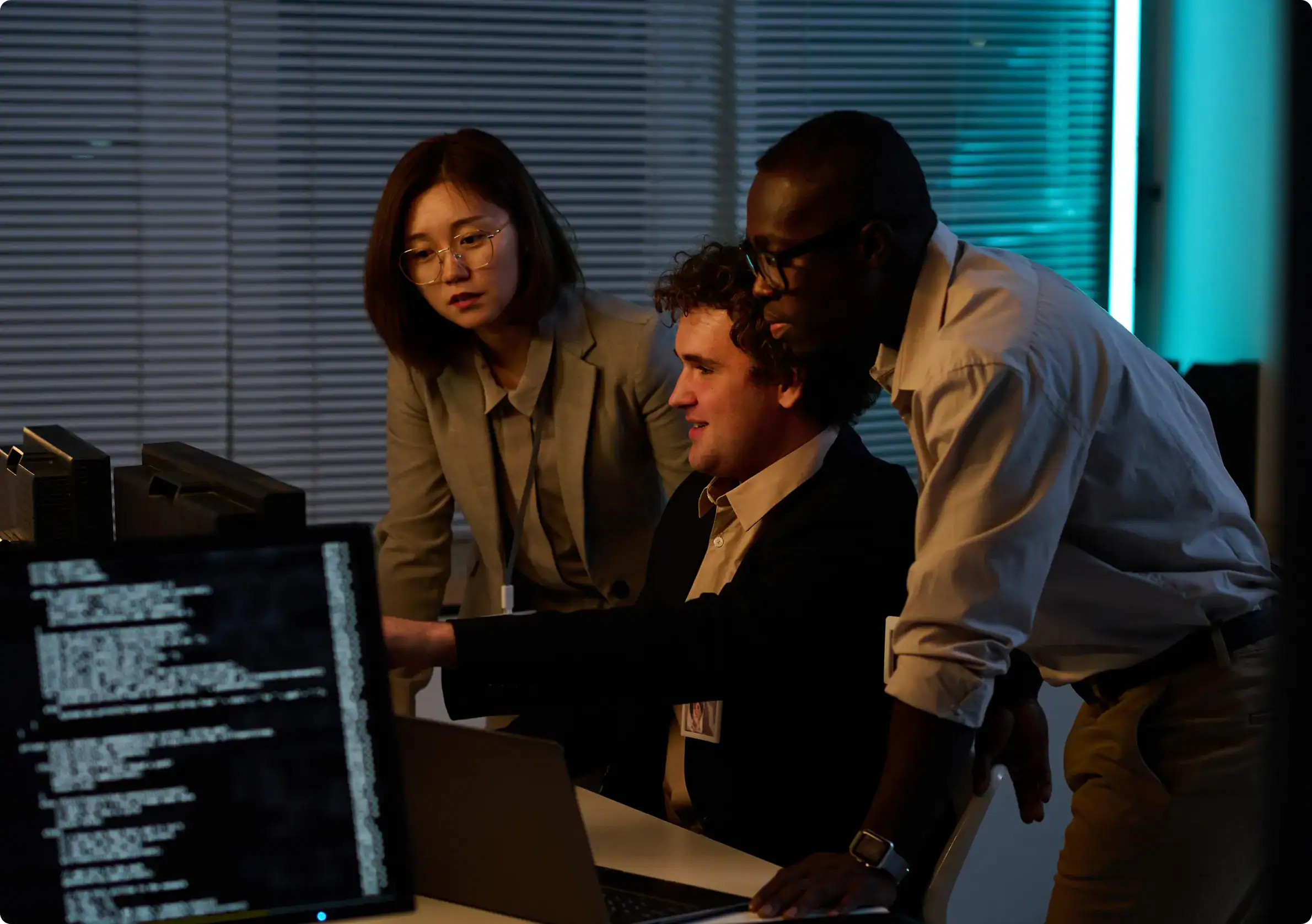 Professionals collaborating on secure access strategy using Entra ID platform