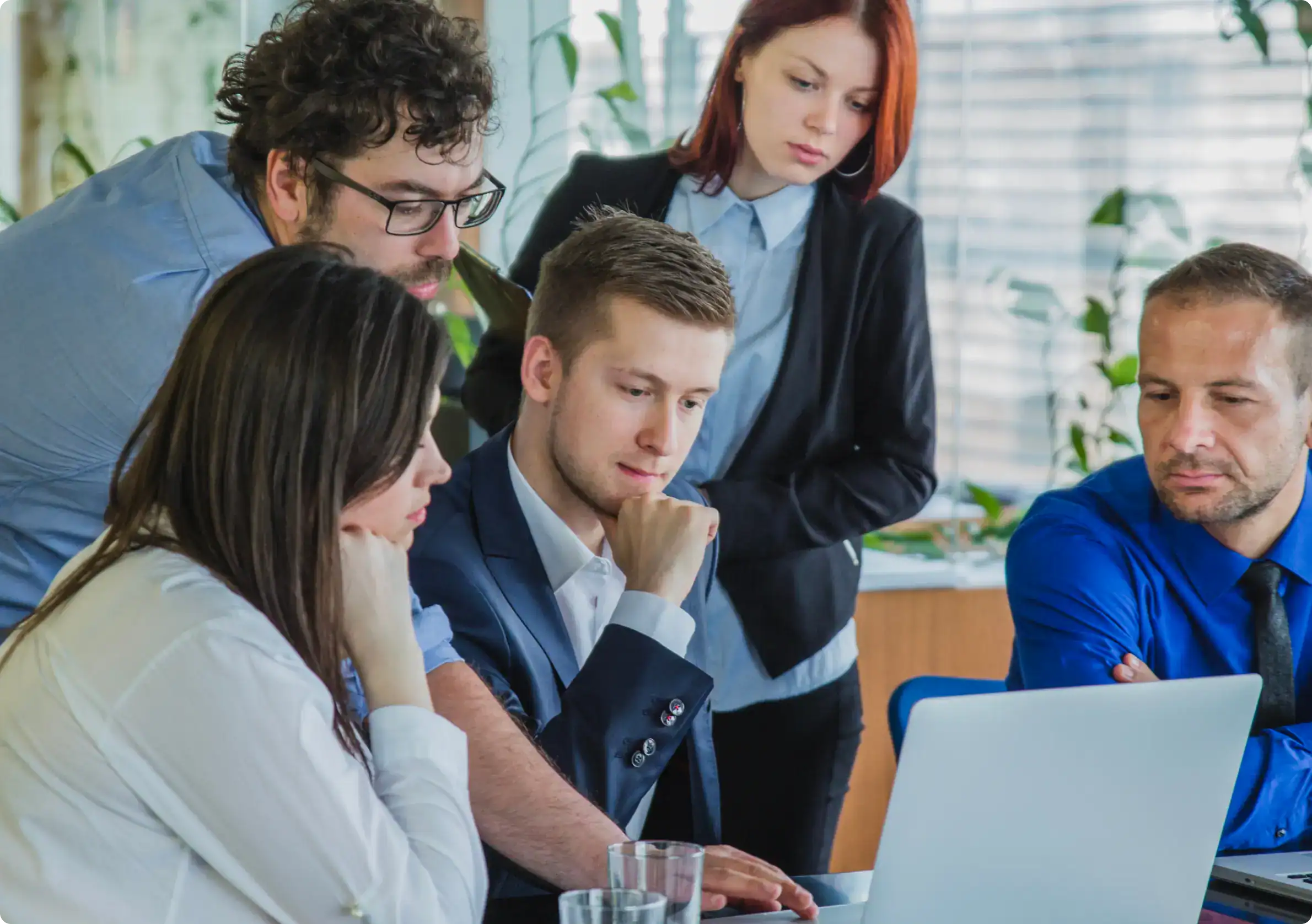 Professionals at Zazz, a web development company in Dubai, engaged in a productive meeting about a custom website build.